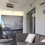 Heliosa 66 Amber Light Infrarot-Heizstrahler in Weiss: effektive Wärme mit wenig Licht und IPX5 Wasserschutz.