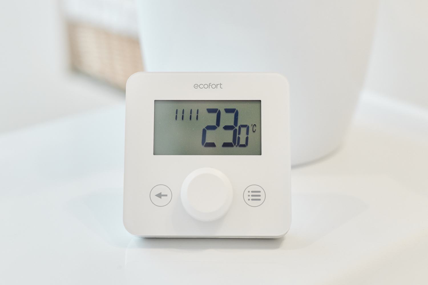Thermostat ecoheat Sensus sur une table